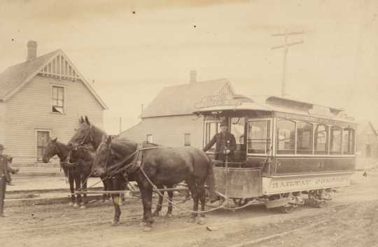 Black and white photograph of a "bobtail" horsecar 94, St. Paul City Railway Company; sign reads Rice Street to West St. Paul via Robert, Ducas, and Concord Streets, c.1883–1889.