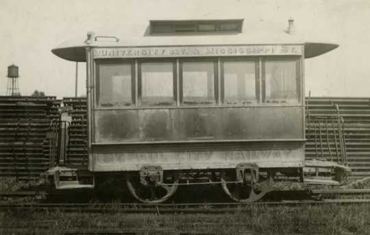 Black and white photograph of St. Paul City Railway horsecar number one at Snelling Shops storage shed prior to reconditioning for the fiftieth anniversary of the opening of the first horsecar line in St. Paul, 1922.