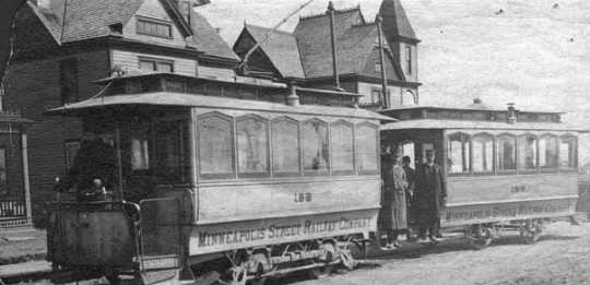Black and white photograph of the first electric street cars in Minneapolis, c.1889.