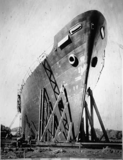Black and white photograph of a Navy tanker being built at Savage, ca. 1942.