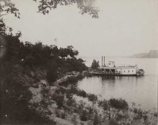 Black and white photograph of the steamer Ethel Howard, 1898. The Ethel Howard, shown here at Central Point, delivered the bodies of victims of the sinking of the Sea Wing to Red Wing in 1890. 