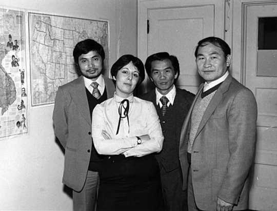 Black and white photograph of staff at Lao Family Community, Saint Paul, Ramsey County, 1981. 