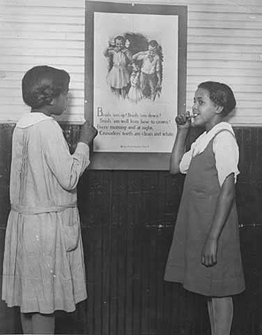 Black and white photograph teaching good health habits, Phyllis Wheatley House, ca. 1920.