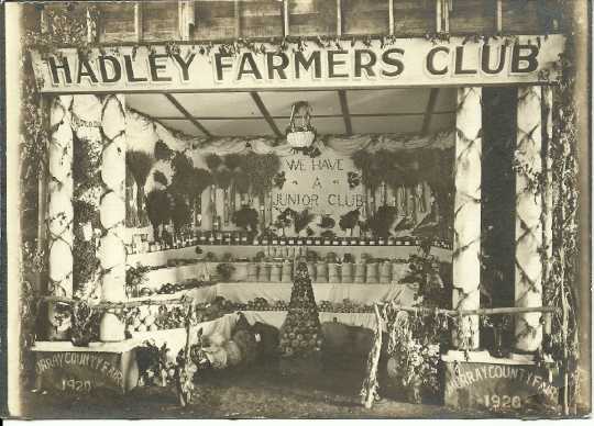 Black and white photograph of the Hadley Farmers’ Club booth at the Murray County Fair, 1920.