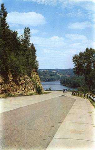 Color image of Highway 8 entering Interstate Park, Taylors Falls, MN, 1945.