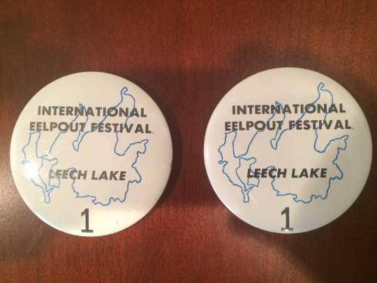 Buttons issued the first year of the International Eelpout Festival, 1980. The buttons were numbered, but four buttons featured the number “1” for Don and Debbie Overcash, Ken Bresley, and Barbara Robers. From the private collection of Don Overcash, used with permission.