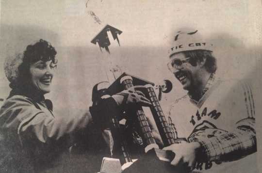 Diane Maas of Walker receives the first annual International Eelpout Festival trophy from Minneapolis Tribune sportswriter Ron Schara, 1980. Diane’s prize-winning eelpout weighed in at eight pounds eleven ounces. Photo by Don Smith, Walker Pilot-Independent. Used with permission.
