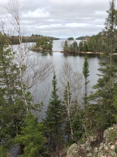 Color image of a rocky hillside and Lake Vermilion. Photograph by Minnesota Department of Natural Resources Staff, May 22, 2014.