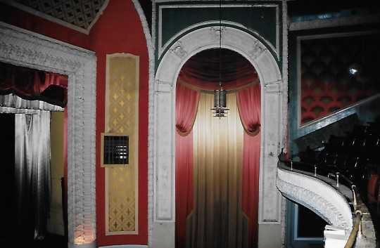 Color image of front of theater showing arch and edge of balcony, 2005.