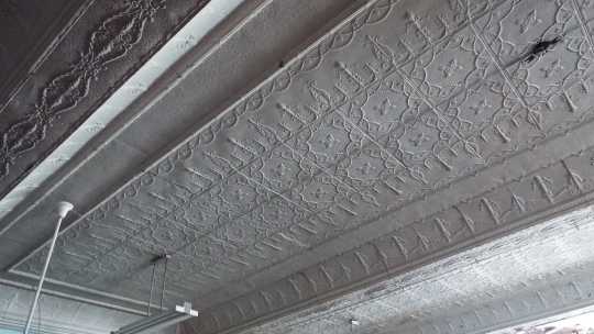 Color image of a metal ceiling in city chambers, second floor of Crookston city hall, 2016.