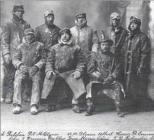 Black and white photograph of Crookston firefighters after a fire on December 27, 1904. 