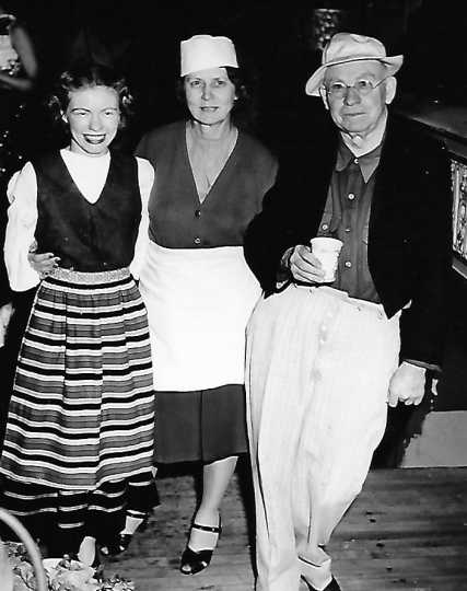 Black and white photograph of Marge McKenzie, Louise Hiller, and Charles Hiller at the Grand Theater, ca. 1940s.