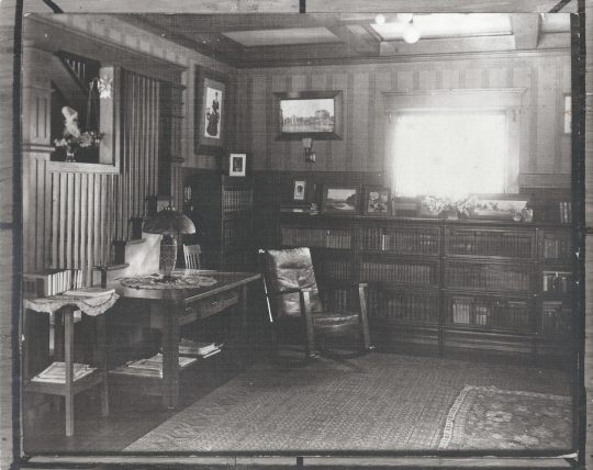 Black and white photograph of the living room of the Keck family home, ca. 1912.