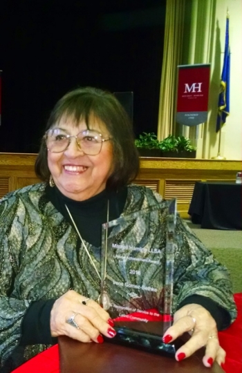 Irene Gomez-Bethke with her lifetime achievement award