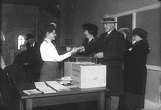 Minnesota Governor J. A. O. Preus and Idelle Preus voting, ca. 1920.