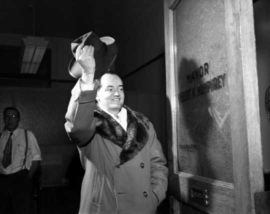 Black and white photograph of Hubert H. Humphrey says goodbye to the Minneapolis Mayor's office after winning a seat in the U.S. Senate, November 30, 1948.