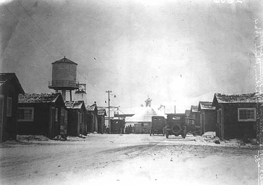 Black and white photograph of the main Street of the Milford Mining Company in Crosby, 1924.