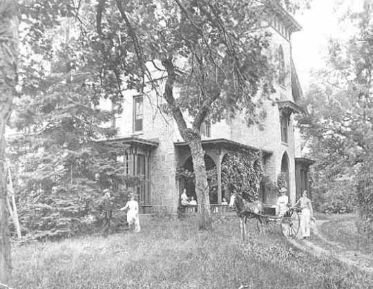 Members of the LeDuc family in front of their estate