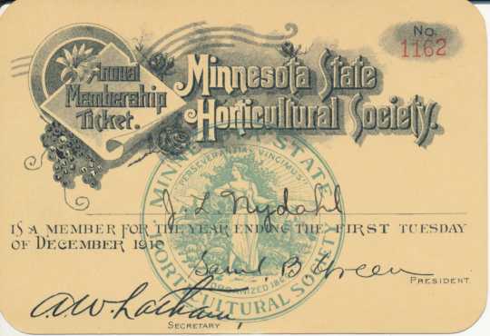 Color scan of an annual membership ticket for member J. L. Nydahl, signed by executive secretary A. W. Latham, 1910. 