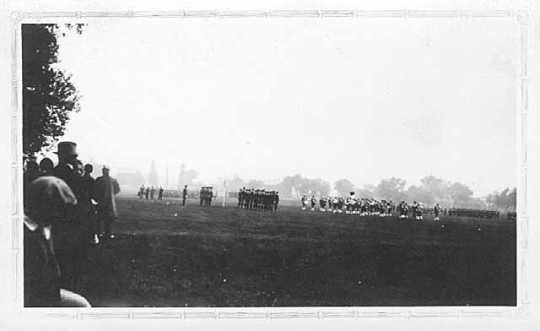 Black and white photograph of Third Infantry passing in review for Maud Hart Lovelace, author of Early Candlelight, which was set at Fort Snelling, September 1929.