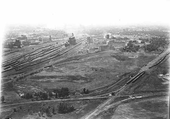 Black and white aerial view showing Great Northern Railway yards in southeast Minneapolis , ca. 1921. Photograph by Paul W. Hamilton.