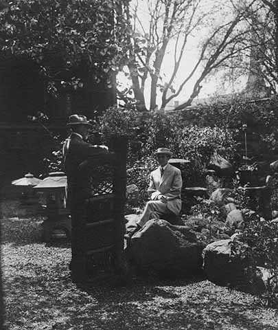 Black and white photograph of John S. Bradstreet and Sam Trubshaw (one of his designers) in the Crafthouse Japanese garden, ca. 1910. 