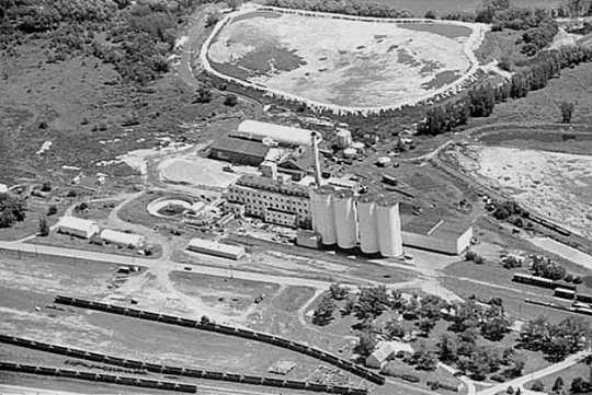 Black and white aerial view of the American Crystal Sugar factory in Chaska. Photographed by Vincent H. Mart in 1969.