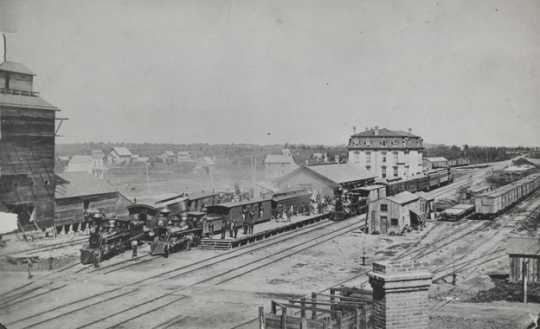 Black and white photograph of the arrival of the Milwaukee train, Austin, Minnesota, 1874.