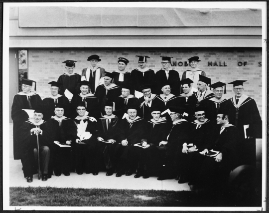 Black and white photograph of 26 Nobel Laureates take part in the dedication of the Alfred Nobel hall of Science at Gustavus Adolphus College, St. Peter, 1963. 