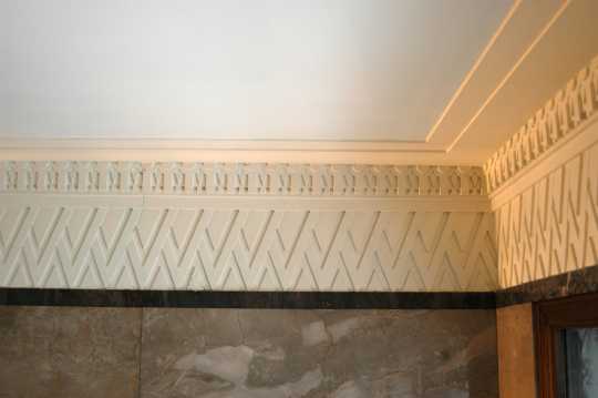Color image of zig-zag plastered crown molding inside the Minnesota Building, 2009.