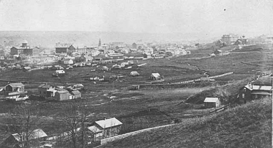 Black and white panoramic view of St. Paul, showing the State Capitol, background left, ca. 1870