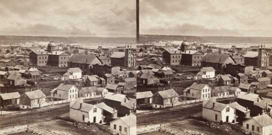 Black and white view of St. Paul from Park Place Hotel, looking southeast toward the first State Capitol, ca. 1871.