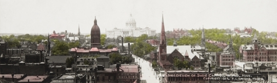 Black and white photograph of St. Paul looking up Cedar Street toward the third capitol building. The tower of the second capitol is visible left of center, 1904.  Photographed by Francis L. Wright.