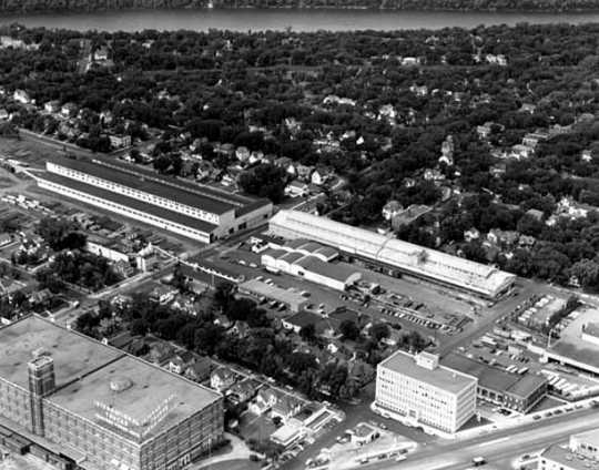 Black and white aerial photograph of Weyerhaeuser Twin City yard and surrounding area, 2563 Franklin Avenue, St. Paul, 1953.