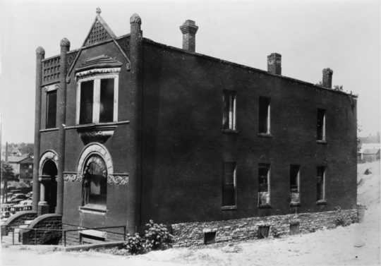 Black and white photograph of Nina Clifford’s brothel at 147 S. Washington Street, St. Paul, 1937. 