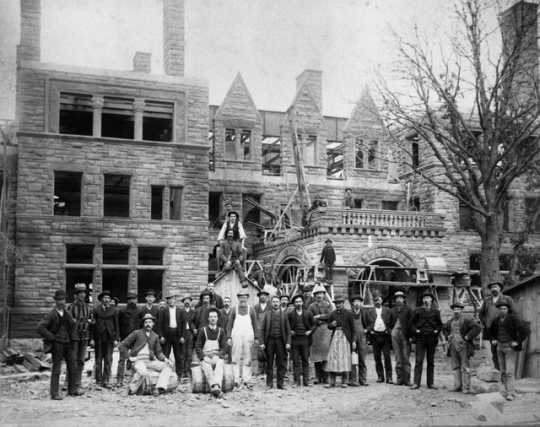 Black and white photograph of a construction crew at the James J. Hill House in St. Paul, Minnesota in 1891.