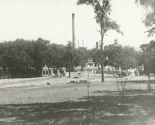 Black and white photograph of the wading pool being built in Central Park, 1929. 