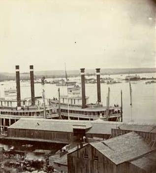 Black and white Photo print of the steamboats Itasca and War Eagle at the St. Paul levee, 1859.
