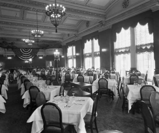 Black and white photograph of the dining room in the St. Paul Athletic Club, c.1925. Photograph by Charles P. Gibson.