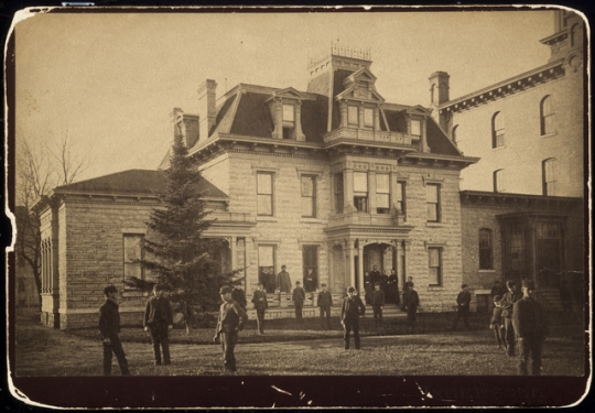 Black and white photograph of the front exterior of the Minnesota State Reform School. Taken by T.W. Ingersoll c.1875.