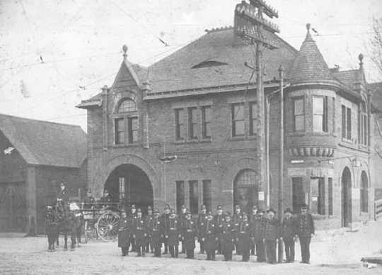 Black and white photograph of the Rondo Street police station at the intersection of Rondo Street and Western Avenue, ca. 1900. 