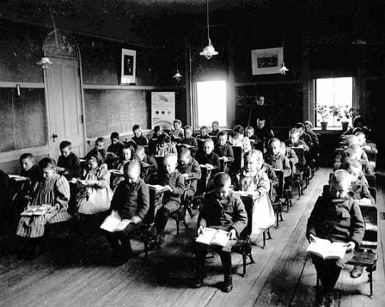 Black and white photograph of a classroom at the State School, c.1905.