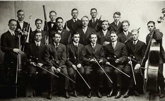 Elmer Uggen, shown here with his violin in the Agassiz yearbook, (front row, third from left) served as concertmaster for the North Dakota Agricultural College Orchestra in 1914 and 1915.
