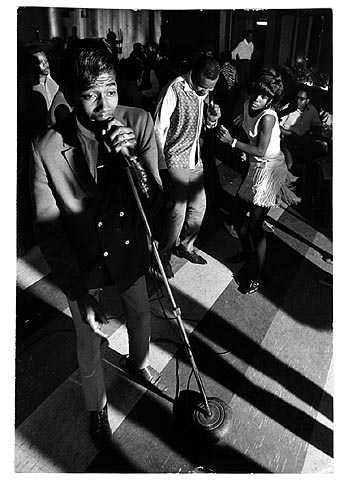 Singer Maurice McKennies with The Blazers performing in the Cozy Bar club on Plymouth Avenue in North Minneapolis, ca. 1968. Photo by Mike Zerby, Minneapolis Tribune.