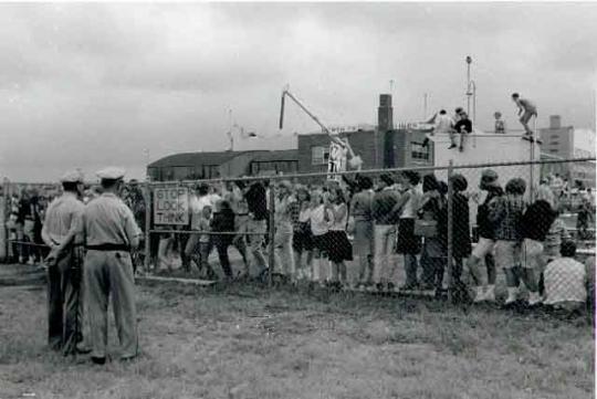 Fans waiting for the Beatles at Twin City Metropolitan Airport