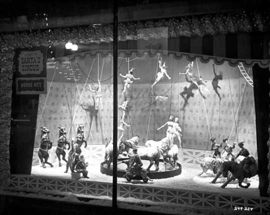 Black and white photograph of Santa's Circus show window, Dayton's, 1957.