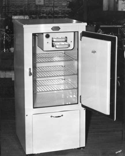 Black and white photograph of an electric refrigerator, 1931.