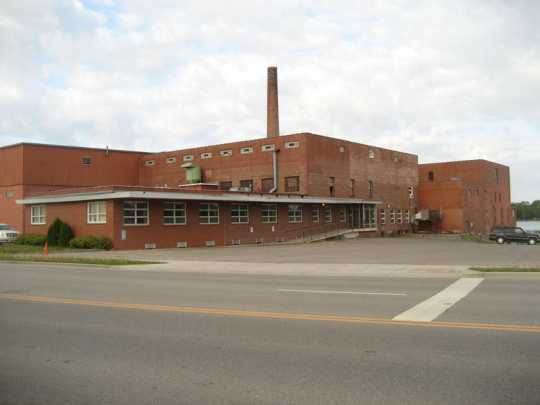 Color image of north and east façades, of Faribault Woolen Mill Company, 2011.