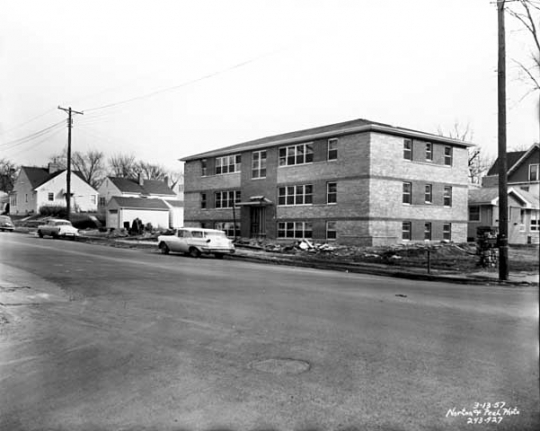 View of an apartment building at 2419 Plymouth Avenue in Near North Minneapolis. ca. 1957. Photo by Norton & Peel.