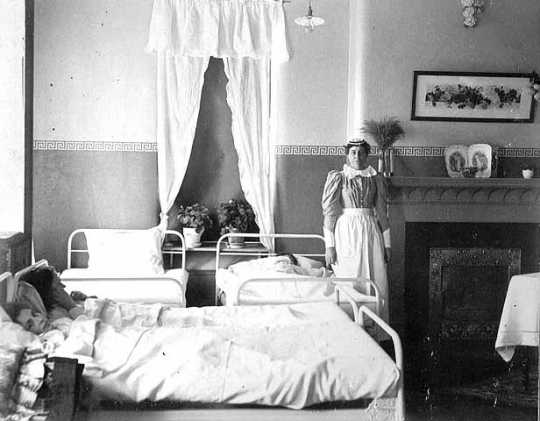 Nurse with patient in Fergus Falls State Hospital.